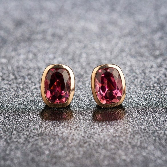 14k Gold 2.58 Ct Natural Tourmaline Earrings: Ref:231192430 // gold content:14k gold // main gemstone:tourmaline // shape:cushion // carat weight:2. 58ct // color:red // treatment:natural // Condition: New Low Estimate: 2100.00 High Estimate: 310