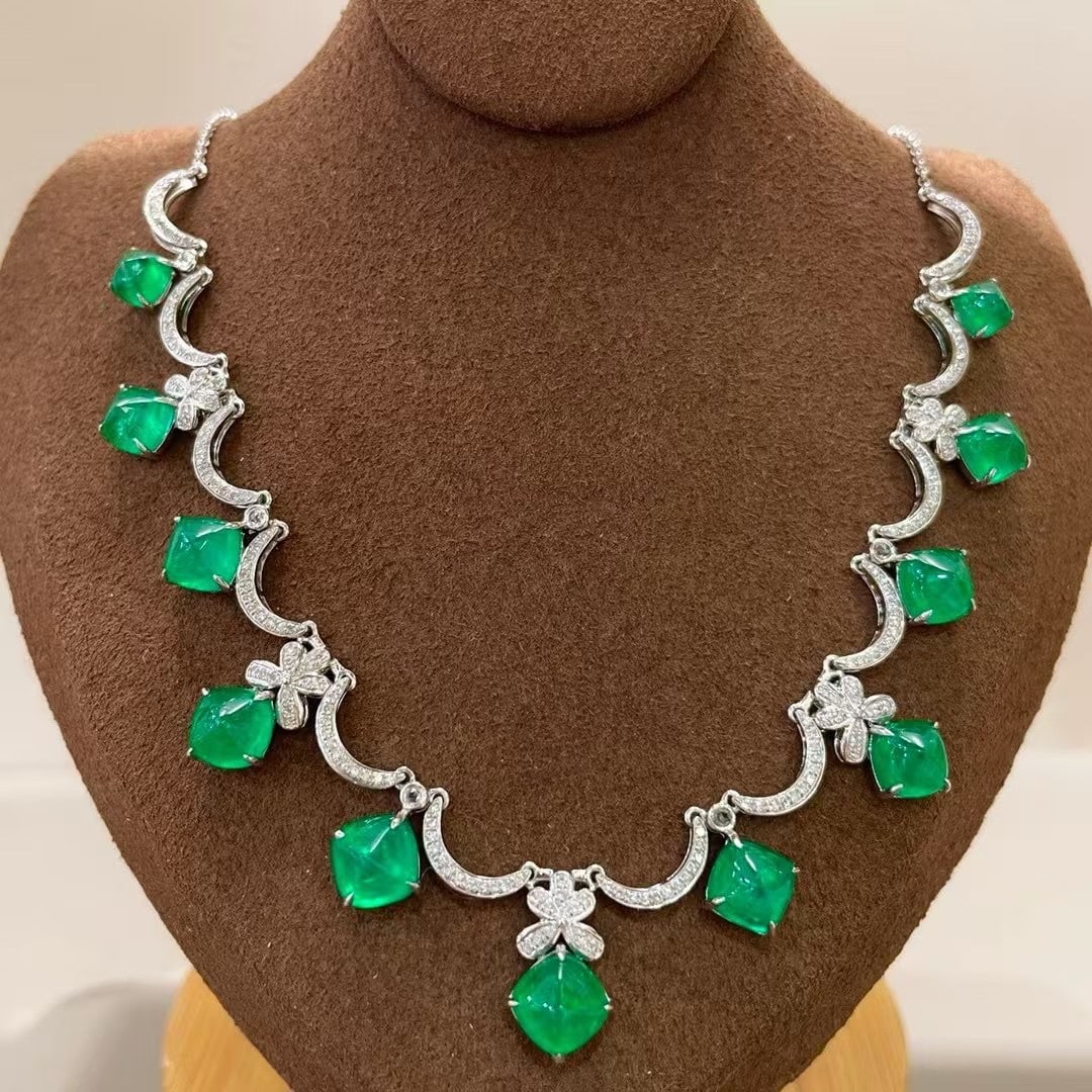 14k Gold 10.57 Ct Vivid Green Natural Emerald & Diamond & Sapphire Necklace: Ref:231063023 // gold content:14k gold // main gemstone:emerald // shape:sugar-loaf // carat weight:10. 57ct // color:vivid green // treatment:natural // // adjacent gemstone 2 : diamond //