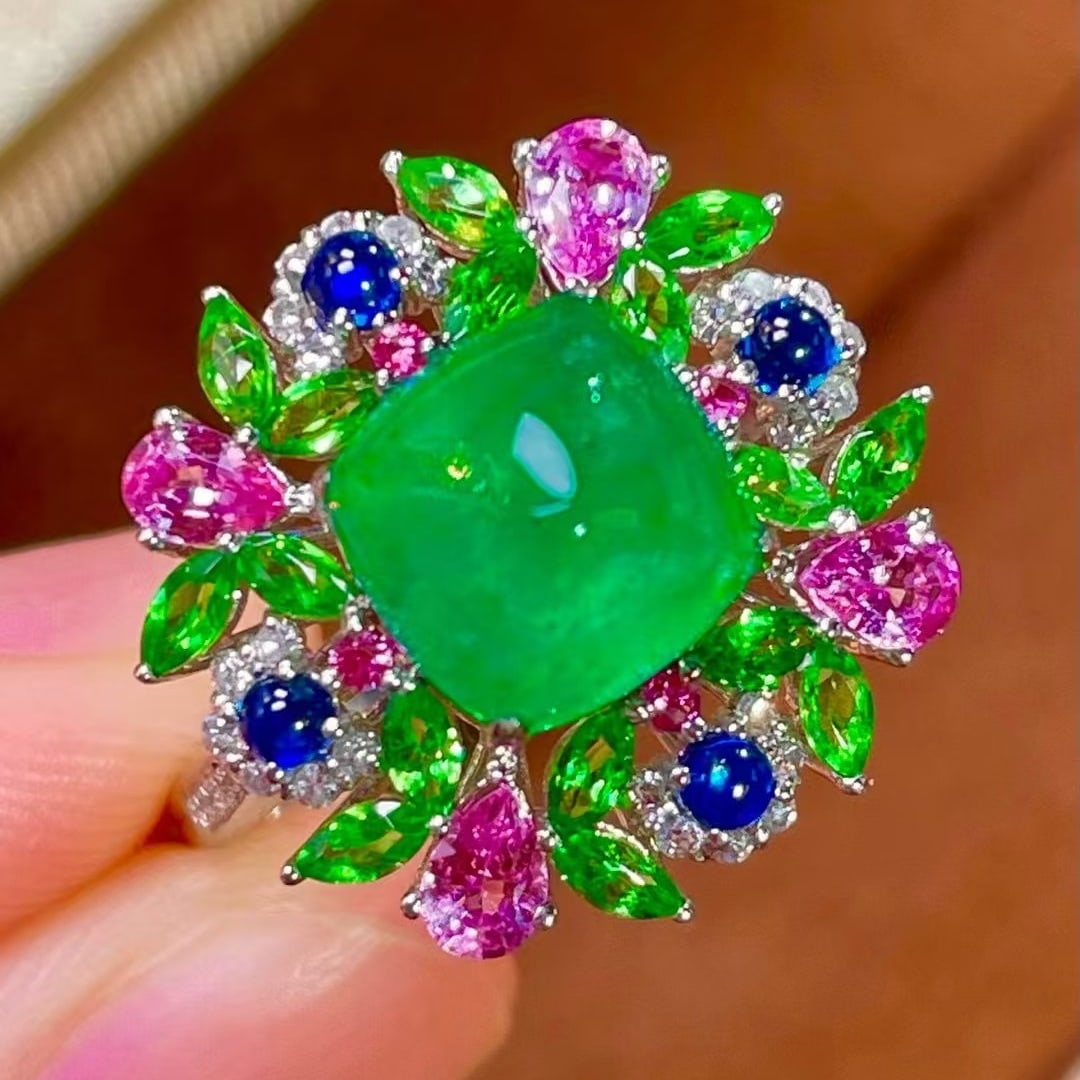 14k Gold 2.65 Ct Vivid Green Natural Emerald & Diamond & Sapphire & Tsavorite Ring: Ref:231063030 // gold content:14k gold // ring size:7. 25us // // main gemstone:emerald // shape:sugar-loaf // carat weight:2. 65ct // color:vivid green // treatment:natural // // adjacent