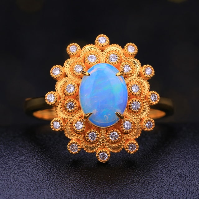 14k Gold 1.01 Ctw Natural Opal & Diamond Ring: Ref:231063072 // gold content:14k gold // ring size:7. 25us // // main gemstone:opal // shape:oval // carat weight:0. 82ct // color:white // treatment:natural // // adjacent gemstone 2 : diamond