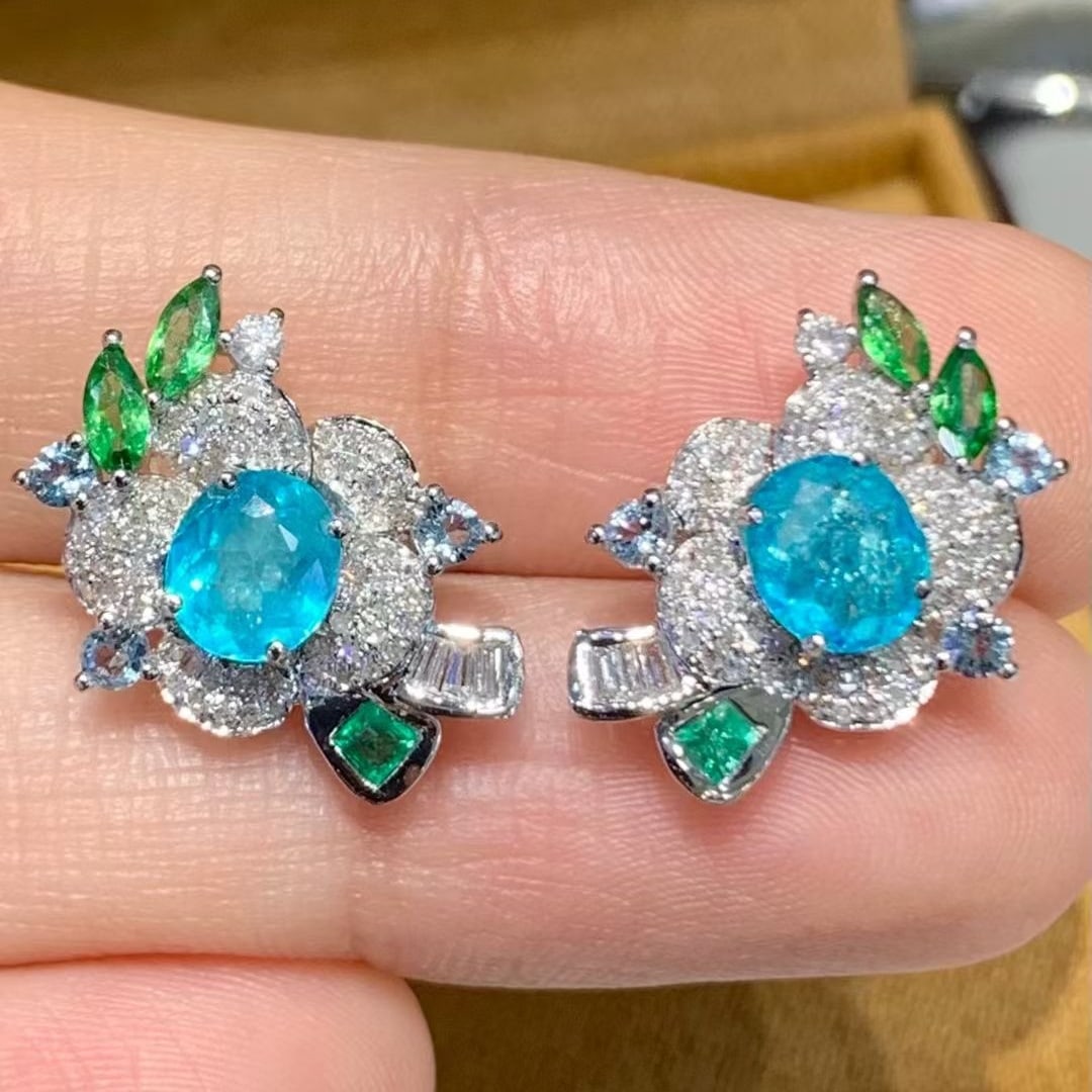 14k Gold 1.3 Ct Natural Paraiba Tourmaline & Diamond Earrings: Ref:231063088 // gold content:14k gold // main gemstone:paraiba tourmaline // shape:oval // carat weight:1. 3ct // color:blue // treatment:natural // // adjacent gemstone 2 : diamond //