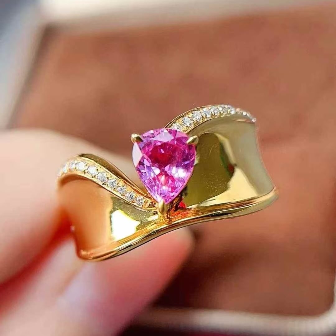 14k Gold 0.7 Ct Natural Sapphire & Diamond Ring: Ref:231063108 // gold content:14k gold // ring size:7. 25us // // main gemstone:sapphire // shape:pear // carat weight:0. 7ct // color:pink // treatment:natural // // adjacent gemstone 2 : diamond