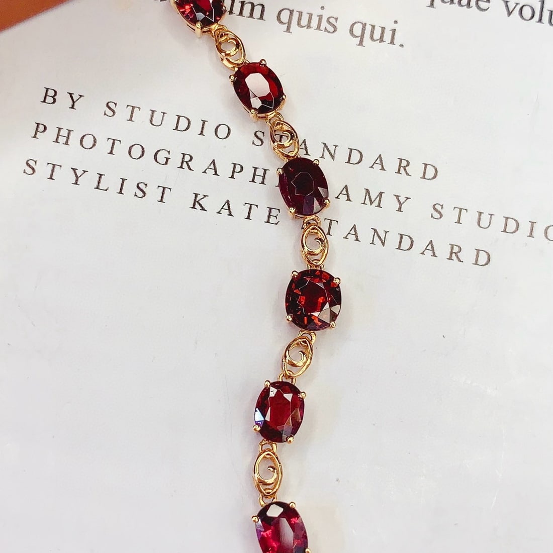 14k Gold 5.5 Ct Natural Tourmaline Bracelet: Ref:231063131 // gold content:14k gold // main gemstone:tourmaline // shape:oval // carat weight:5. 5ct // color:red // treatment:natural // Condition: NewLow Estimate: 5100High Estimate: 7600