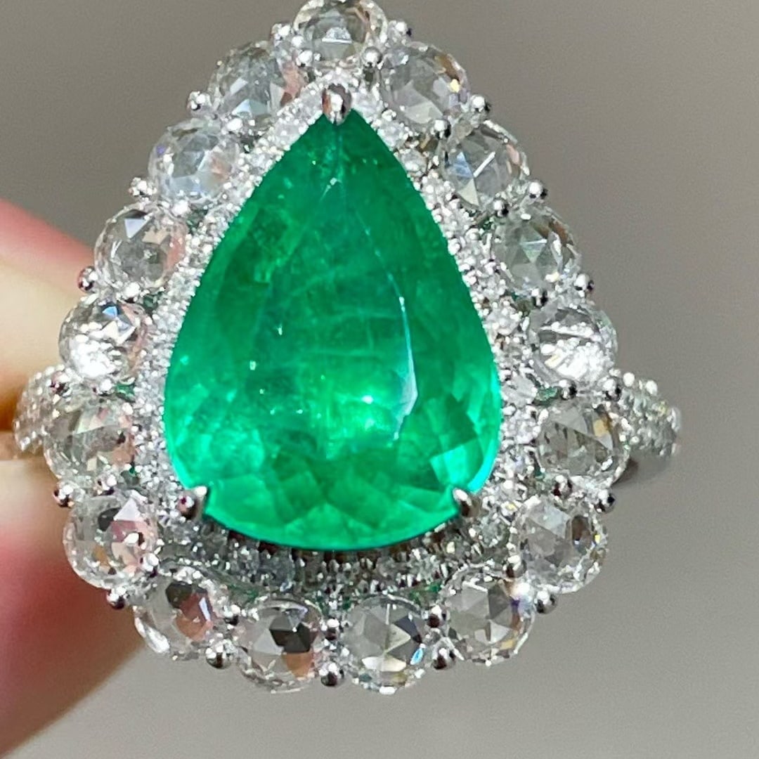 14k Gold 2.72 Ct Natural Emerald & Diamond & Sapphire Ring: Ref:231063145 // gold content:14k gold // ring size:7. 25us // // main gemstone:emerald // shape:pear // carat weight:2. 72ct // color:green // treatment:natural // // adjacent gemstone 2 :