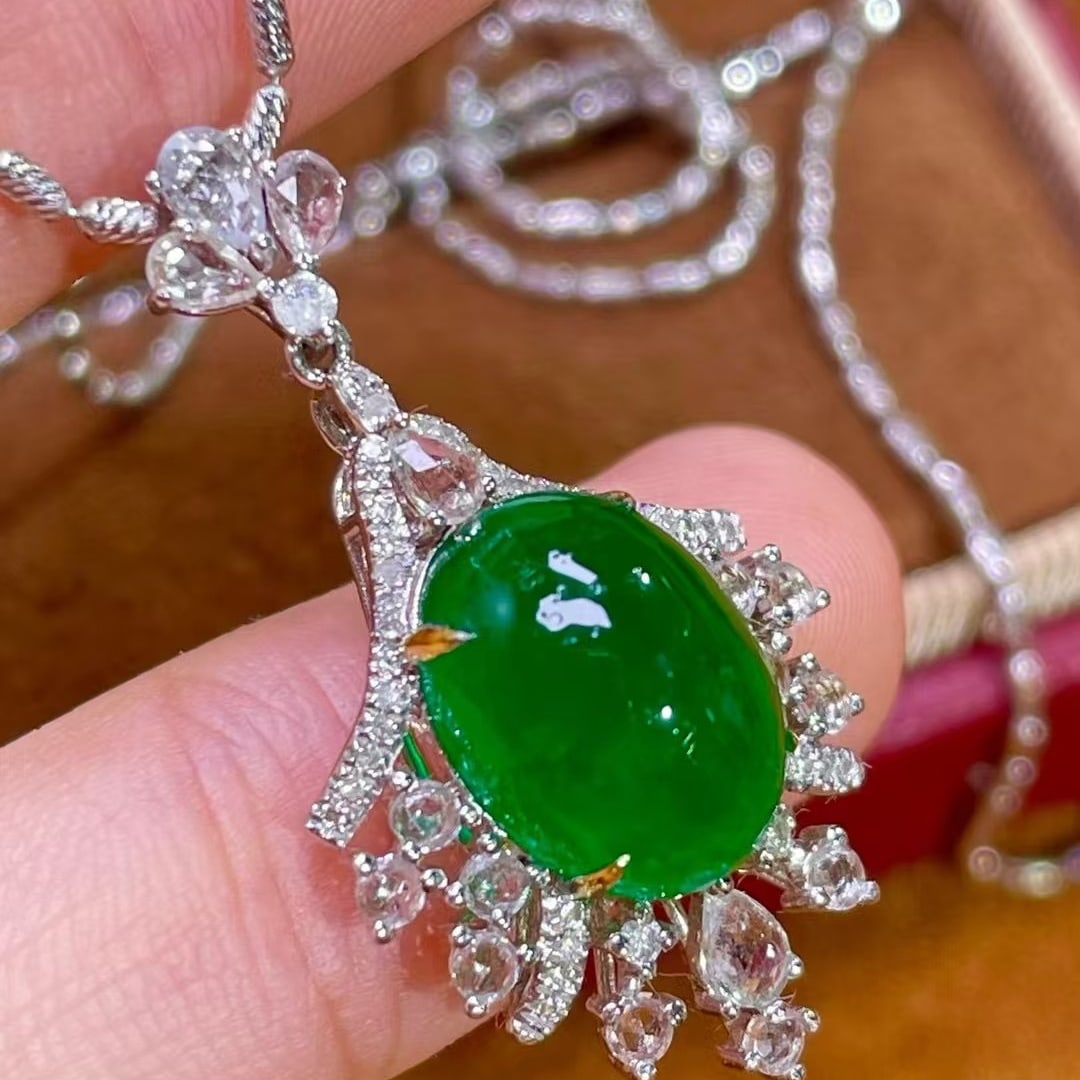 14k Gold 4.8 Ct Vivid Green Natural Emerald & Diamond & Sapphire Pendant( Without Chain ): Ref:231063185 // gold content:14k gold // main gemstone:emerald // shape:oval // carat weight:4. 8ct // color:vivid green // treatment:natural // // adjacent gemstone 2 : diamond // shape:round //