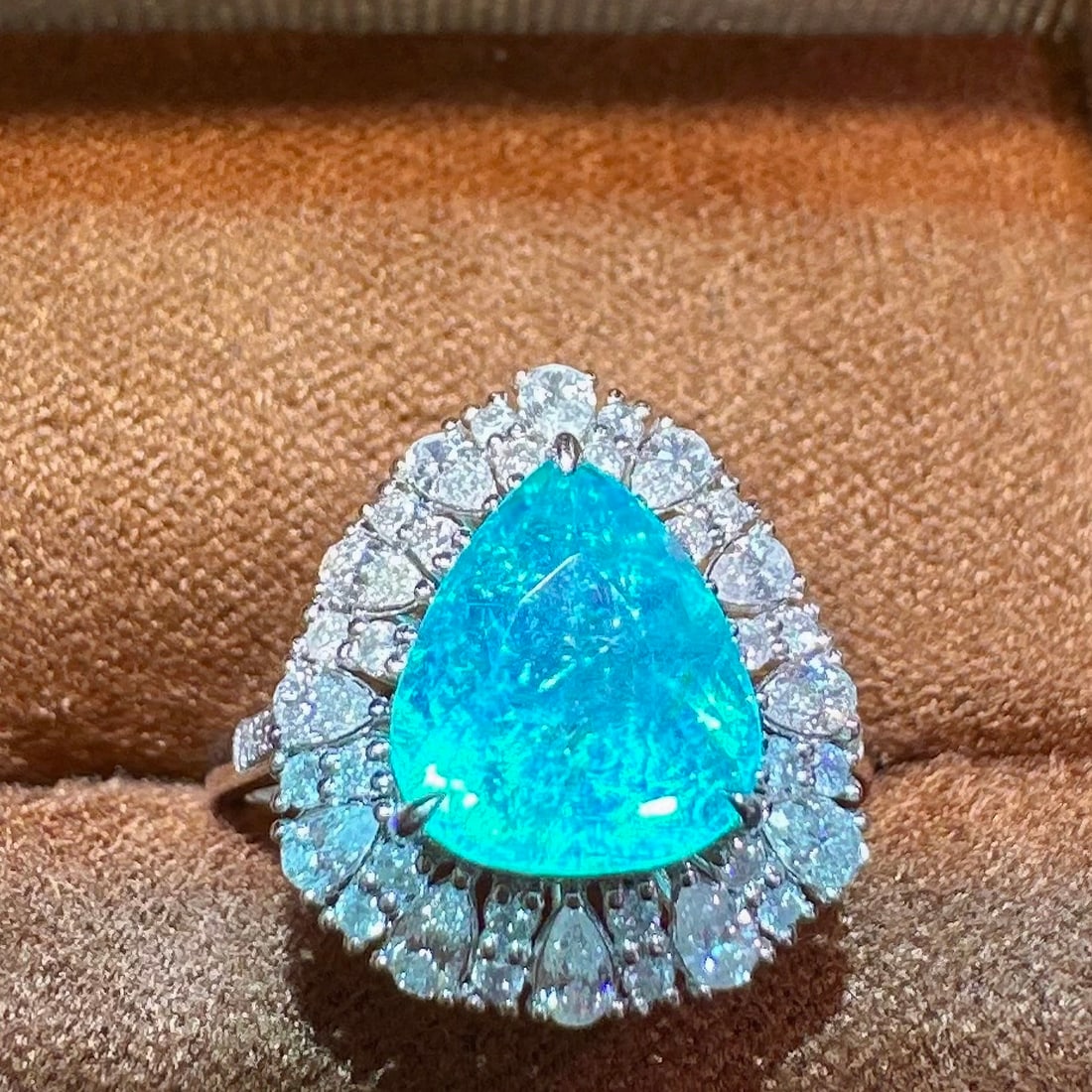 14k Gold 3.55 Ctw Natural Paraiba Tourmaline & Diamond Ring: Ref:231063211 // gold content:14k gold // ring size:7. 25us // // main gemstone:paraiba tourmaline // shape:pear // carat weight:2. 82ct // color:blue // treatment:natural // // adjacent gemstone