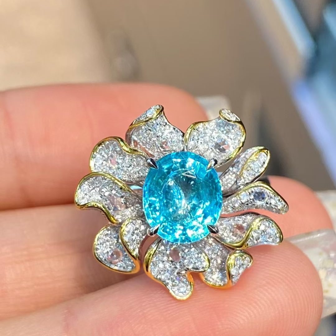 14k Gold 2.74 Ctw Natural Paraiba Tourmaline & Diamond Ring: Ref:231063242 // gold content:14k gold // ring size:7. 25us // // main gemstone:paraiba tourmaline // shape:oval // carat weight:2. 1ct // color:blue // treatment:natural // // adjacent gemstone 2 : d