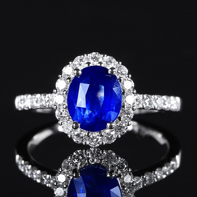 14k Gold 2.57 Ctw Natural Sapphire & Diamond Ring: Ref:231064020 // gold content:14k gold // ring size:7. 25us // // main gemstone:sapphire // shape:oval // carat weight:2. 05ct // color:blue // treatment:natural // // adjacent gemstone 2 : diamond //