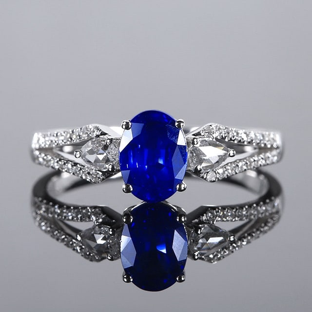 14k Gold 1.34 Ctw Natural Sapphire & Diamond Ring: Ref:231064027 // gold content:14k gold // ring size:7. 25us // // main gemstone:sapphire // shape:oval // carat weight:1. 13ct // color:royal blue // treatment:natural // // adjacent gemstone 2 : diam