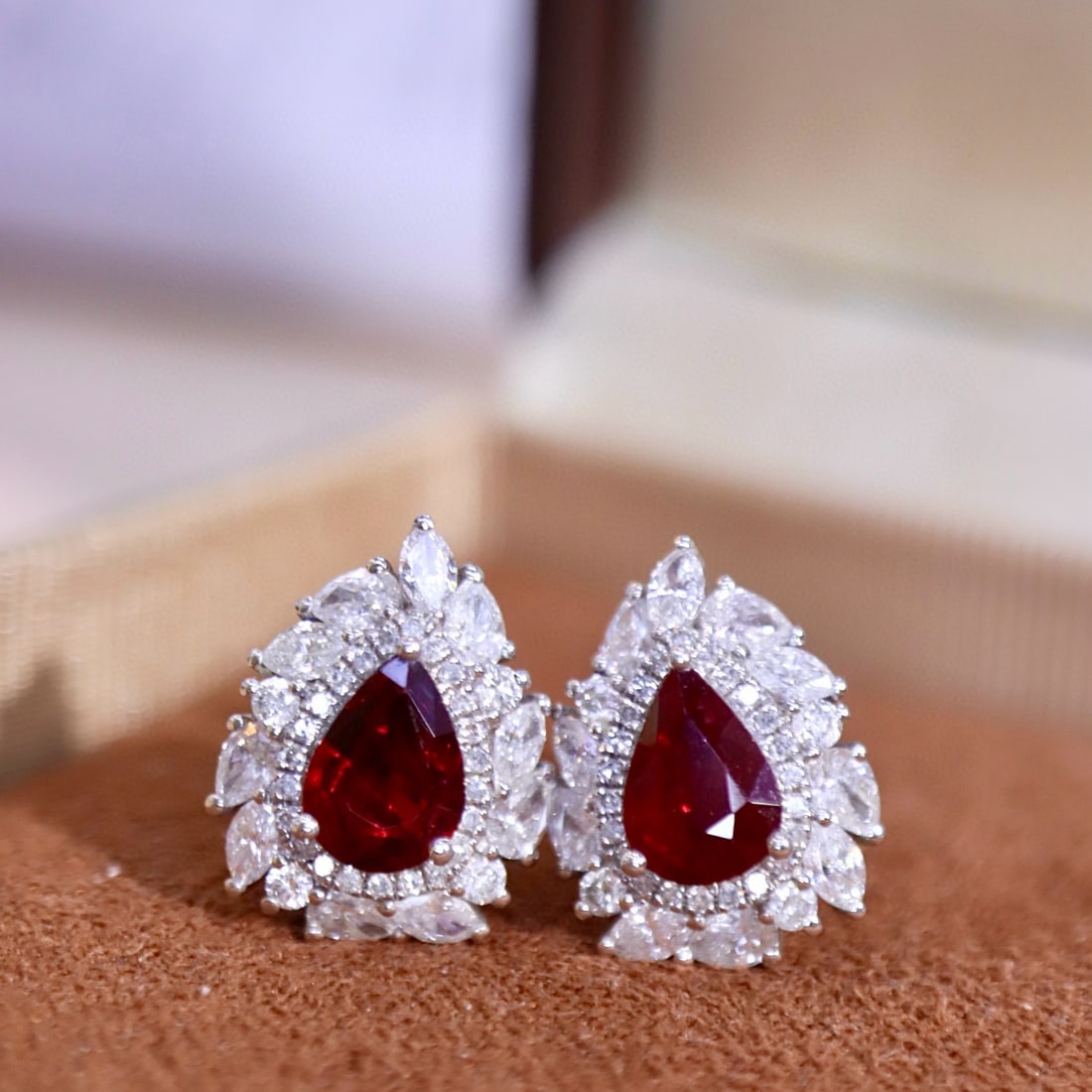 14k Gold 2.65 Ctw Natural Ruby & Diamond Earrings: Ref:231064065 // gold content:14k gold // main gemstone:ruby // shape:pear // carat weight:1. 50ct // color:pigeonblood red // treatment:natural // // adjacent gemstone 2 : diamond // shape:multiply /