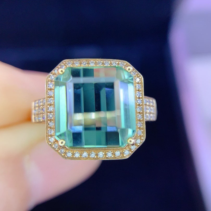 14k Gold 6.8 Ct Natural Tourmaline & Diamond Ring: Ref:231064145 // gold content:14k gold // ring size:7. 25us // // main gemstone:tourmaline // shape:octagonal // carat weight:6. 8ct // color:green // treatment:natural // // adjacent gemstone 2 : dia
