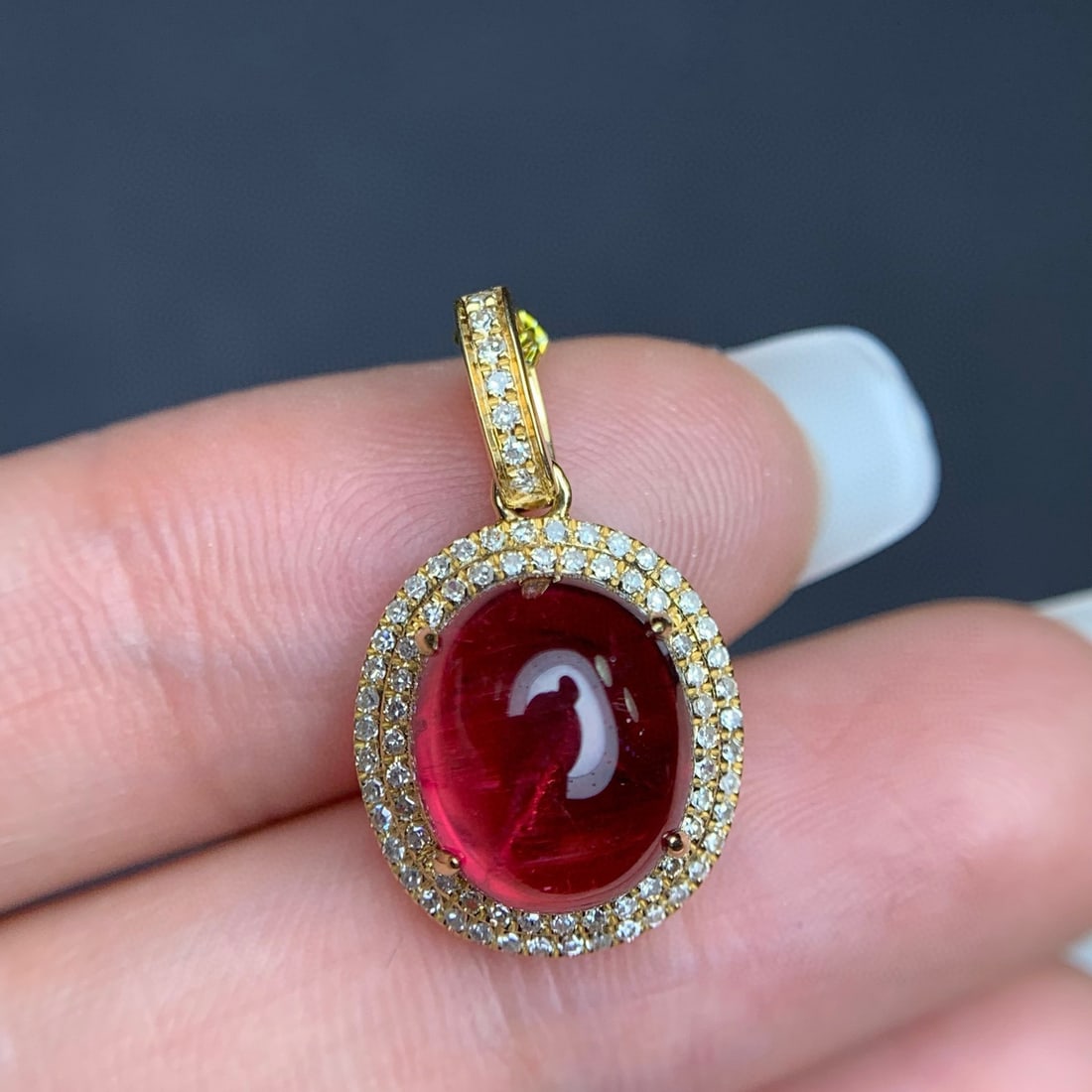 14k Gold 4.75 Ct Natural Tourmaline & Diamond Pendant( Without Chain ): Ref:231064148 // gold content:14k gold // main gemstone:tourmaline // shape:oval // carat weight:4. 75ct // color:red // treatment:natural // // adjacent gemstone 2 : diamond // number of stones:79