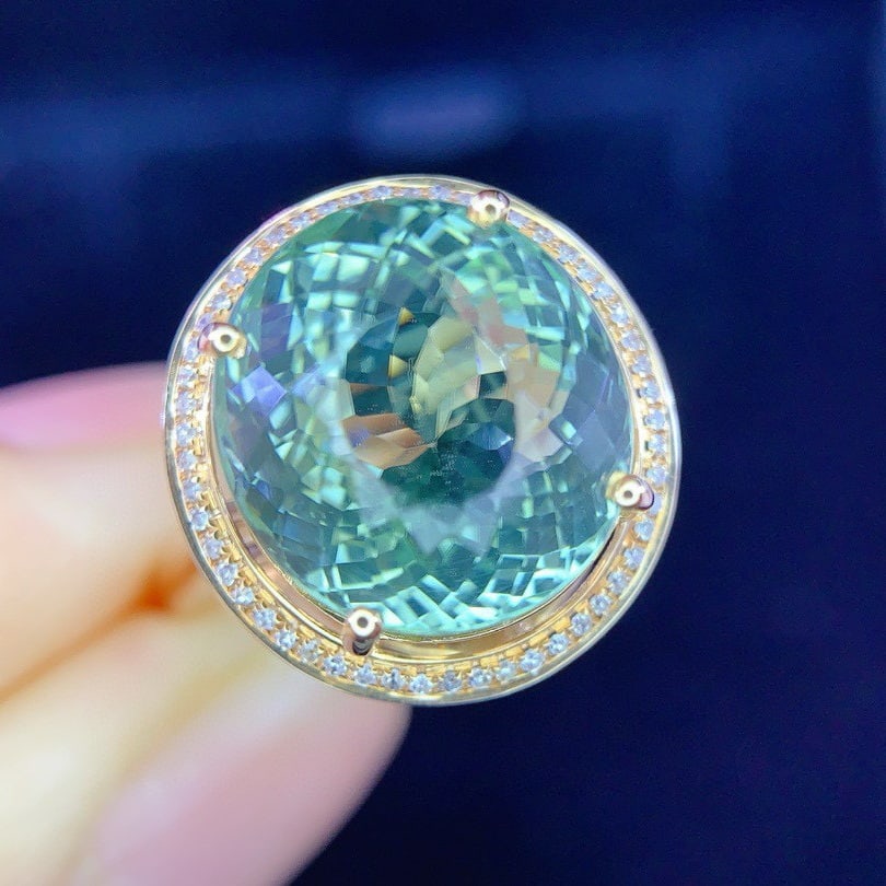 14k Gold 8.0 Ct Natural Tourmaline & Diamond Ring: Ref:231064151 // gold content:14k gold // ring size:7. 25us // // main gemstone:tourmaline // shape:oval // carat weight:8. 0ct // color:green // treatment:natural // // adjacent gemstone 2 :