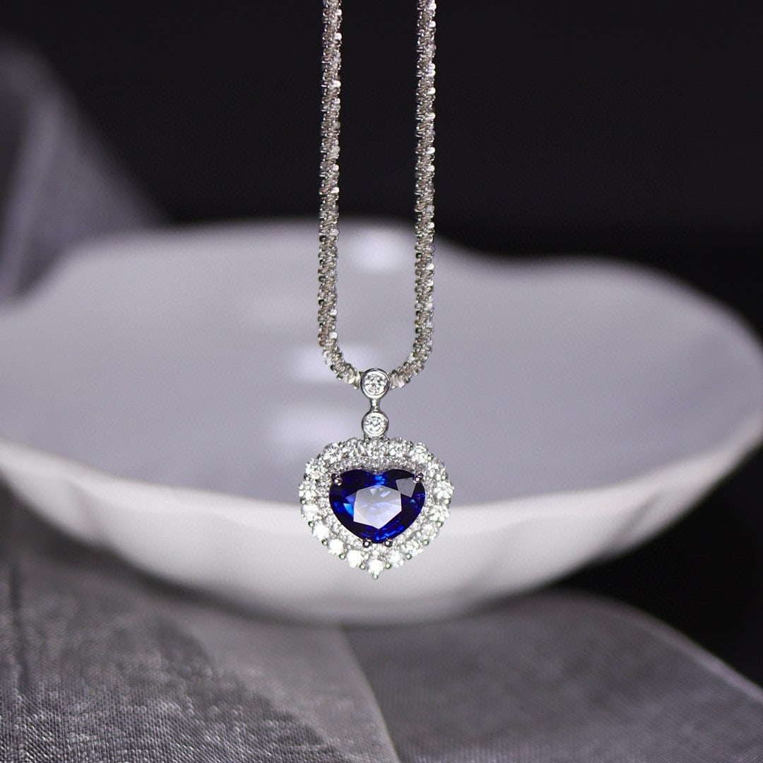14k Gold 2.79 Ctw Natural Sapphire & Diamond Pendant( Without Chain ): Ref:231064213 // gold content:14k gold // main gemstone:sapphire // shape:heart // carat weight:2. 1ct // color:royal blue // treatment:natural // // adjacent gemstone 2 : diamond // shape:round //