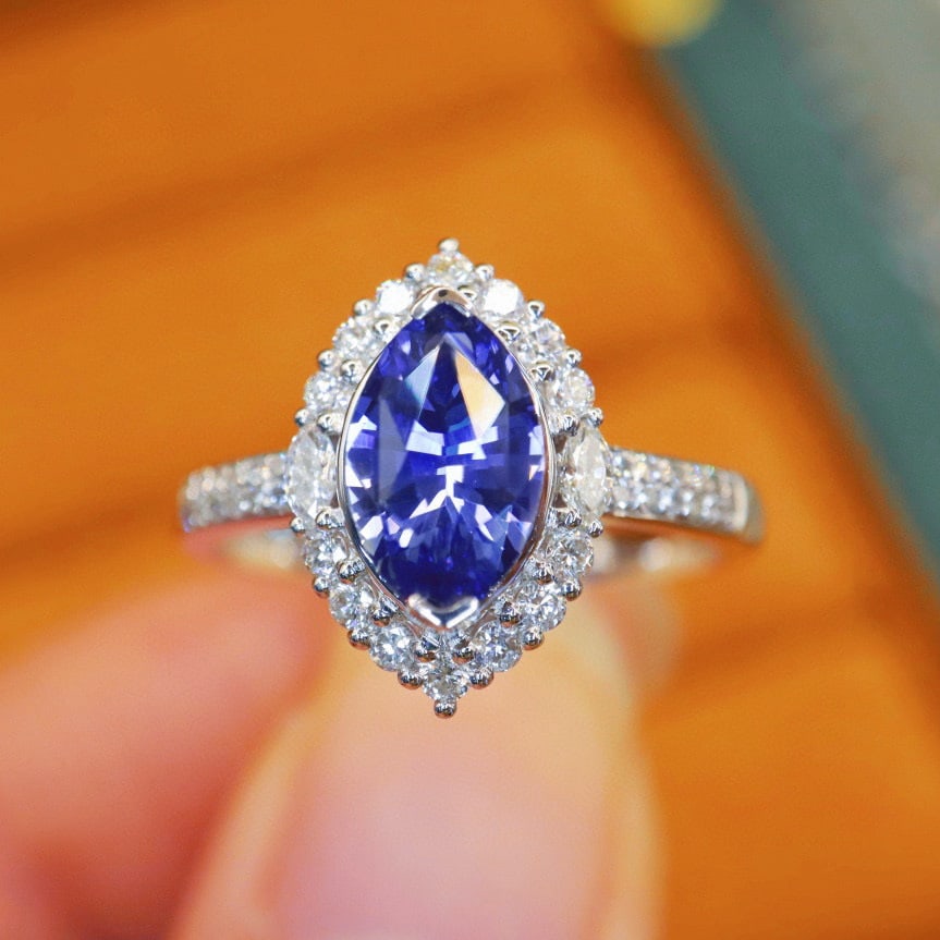 14k Gold 1.97 Ctw Natural Sapphire & Diamond Ring: Ref:231064229 // gold content:14k gold // ring size:7. 25us // // main gemstone:sapphire // shape:marquise // carat weight:1. 62ct // color:cornflower blue // treatment:natural // // adjacent