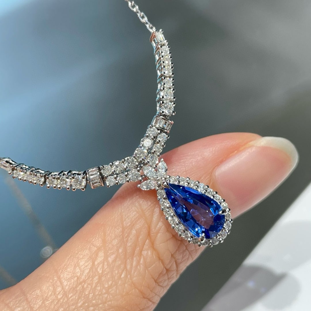 14k Gold 1.6 Ct Natural Sapphire & Diamond Necklace: Ref:231064382 // gold content:14k gold // main gemstone:sapphire // shape:pear // carat weight:1. 6ct // color:blue // treatment:natural // // adjacent gemstone 2 : diamond // shape:multiply //