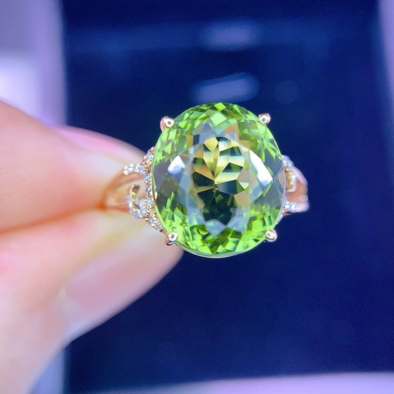 14k Gold 5.9 Ct Natural Tourmaline & Diamond Ring: Ref:231064443 // gold content:14k gold // ring size:7. 25us // // main gemstone:tourmaline // shape:oval // carat weight:5. 9ct // color:green // treatment:natural // // adjacent gemstone 2 :