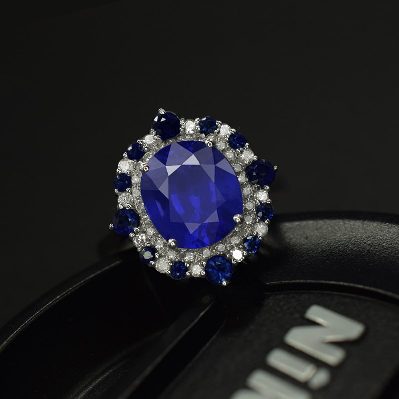 14k Gold 3.47 Ctw Natural Sapphire & Diamond Ring: Ref:231065001 // gold content:14k gold // ring size:7. 25us // // main gemstone:sapphire // shape:oval // carat weight:3. 15ct // color:blue // treatment:natural // // adjacent gemstone 2 :