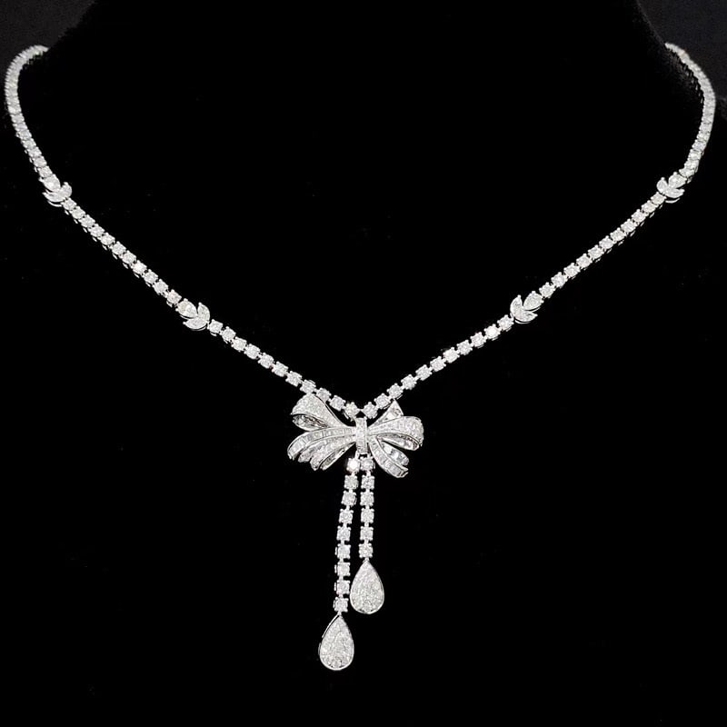 14k Gold 4 Ct Natural H Diamond Necklace: Ref:231065006 // gold content:14k gold // main gemstone:diamond // shape:multiple // carat weight:4ct // clarity grade:vs-si // color:h // treatment:natural // Condition: NewLow Estimate: