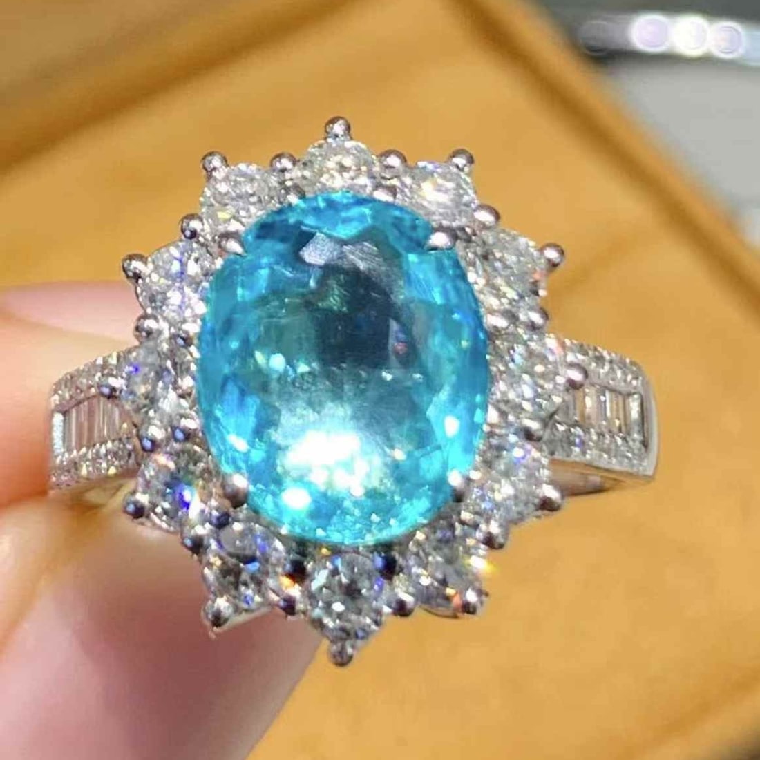 14k Gold 2.23 Ct Natural Paraiba Tourmaline & Diamond Ring: Ref:231065011 // gold content:14k gold // ring size:7. 25us // // main gemstone:paraiba tourmaline // shape:oval // carat weight:2. 23ct // color:blue // treatment:natural // // adjacent gemstone