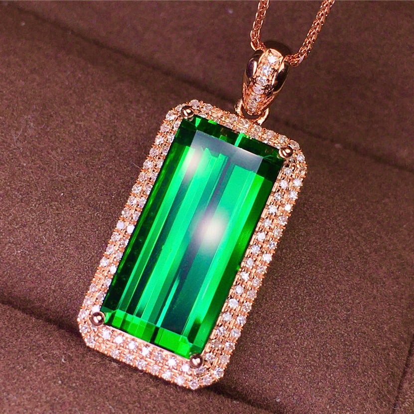 14k Gold 6.9 Ct Natural Tourmaline & Diamond Pendant( Without Chain ): Ref:231065013 // gold content:14k gold // main gemstone:tourmaline // shape:octagonal // carat weight:6. 9ct // color:green // treatment:natural // // adjacent gemstone 2 : diamond // shape:round