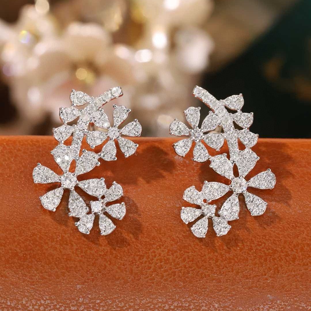 14k Gold 0.6 Ct Natural H Diamond Earrings: Ref:231065042 // gold content:14k gold // main gemstone:diamond // shape:round // carat weight:0. 6ct // clarity grade:vs-si // color:h // treatment:natural // cut grade:g // Condition: New Low Estim