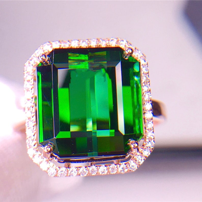 14k Gold 8.9 Ct Natural Tourmaline & Diamond Ring: Ref:231065049 // gold content:14k gold // ring size:7. 25us // // main gemstone:tourmaline // shape:octagonal // carat weight:8. 9ct // color:green // treatment:natural // // adjacent gemstone 2 :
