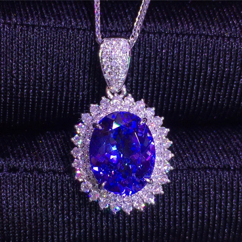 14k Gold 3.2 Ct Natural Tanzanite & Diamond Pendant( Without Chain ): Ref:231065050 // gold content:14k gold // main gemstone:tanzanite // shape:oval // carat weight:3. 2ct // color:blue // treatment:natural // // adjacent gemstone 2 : diamond // shape:round //