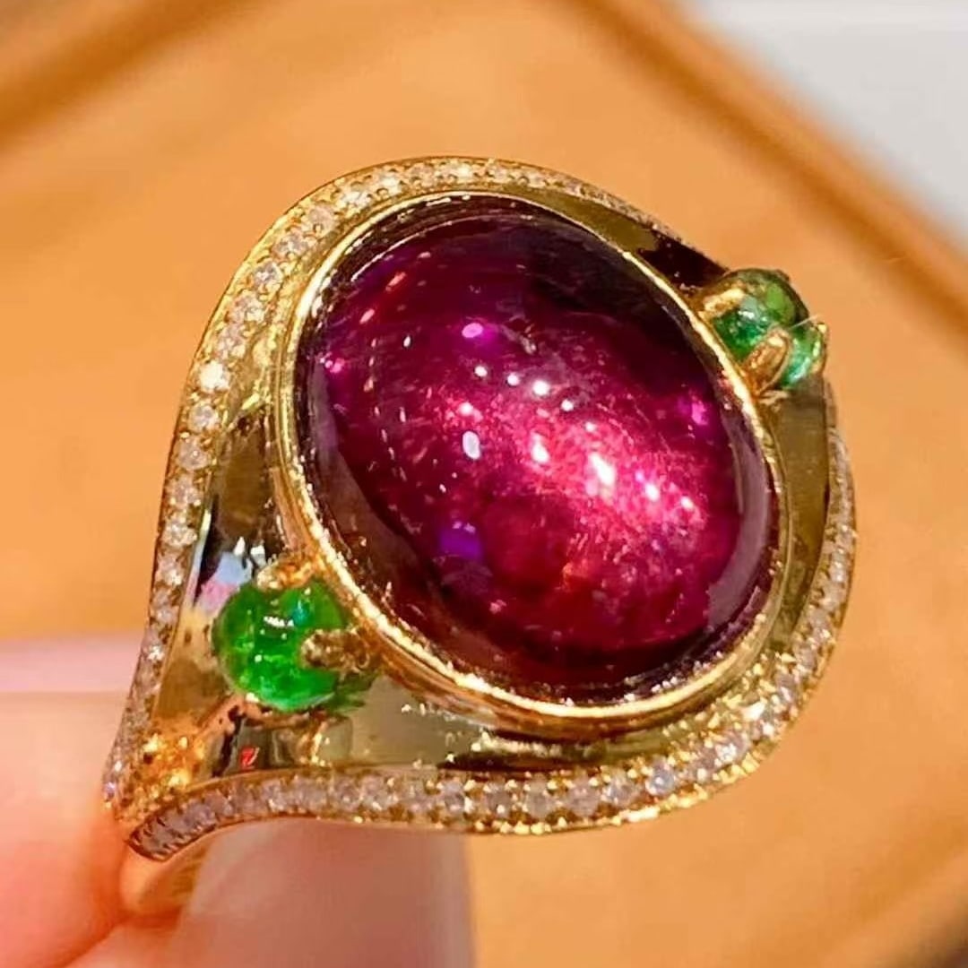 14k Gold 4 Ct Natural Tourmaline & Diamond Ring: Ref:231065128 // gold content:14k gold // ring size:7. 25us // // main gemstone:tourmaline // shape:oval // carat weight:4ct // color:red // treatment:natural // // adjacent gemstone 2 : diamond // sh