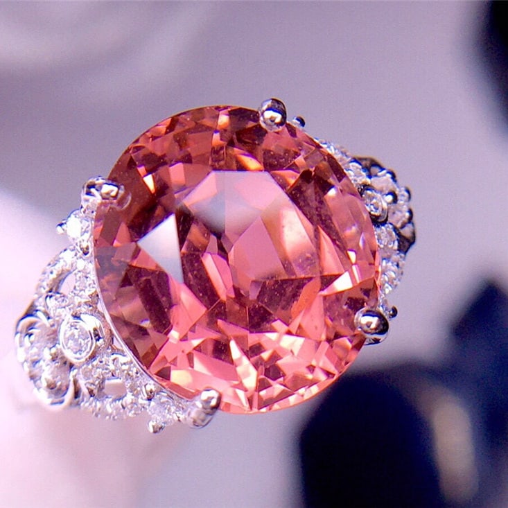 14k Gold 6.85 Ct Natural Tourmaline & Diamond Ring: Ref:231065132 // gold content:14k gold // ring size:7. 25us // // main gemstone:tourmaline // shape:oval // carat weight:6. 85ct // color:red // treatment:natural // // adjacent gemstone 2 : diamond /