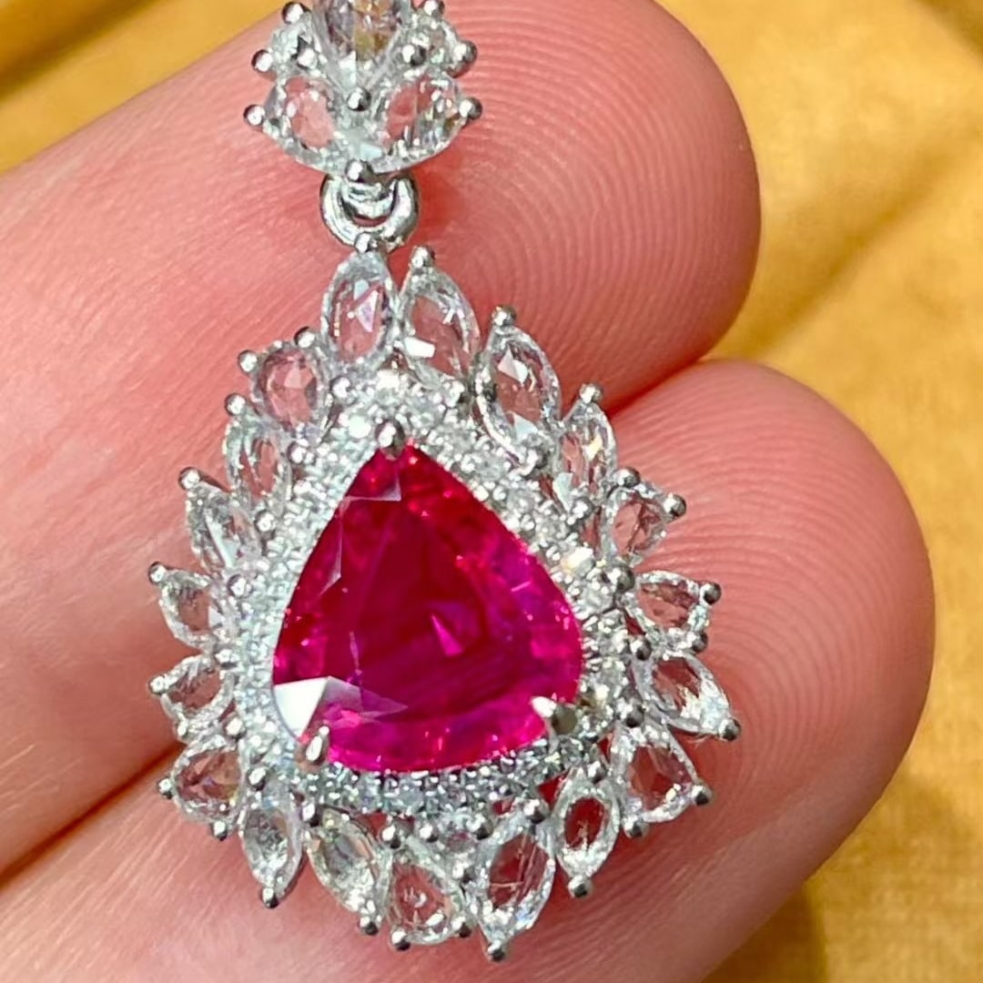 14k Gold 1.38 Ct Natural Ruby & Sapphire & Diamond Pendant( Without Chain ): Ref:231065179 // gold content:14k gold // main gemstone:ruby // shape:pear // carat weight:1. 38ct // color:red // treatment:natural // // adjacent gemstone 2 : sapphire // shape:multiple //