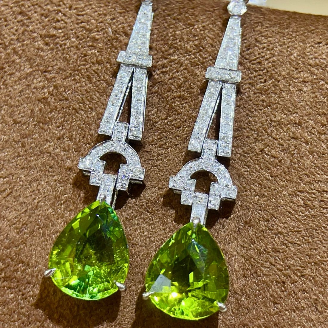 14k Gold 6.19 Ctw Natural Tourmaline & Diamond Earrings: Ref:231065202 // gold content:14k gold // main gemstone:tourmaline // shape:pear // carat weight:5. 90ct // color:green // treatment:natural // // adjacent gemstone 2 : diamond // shape:round //