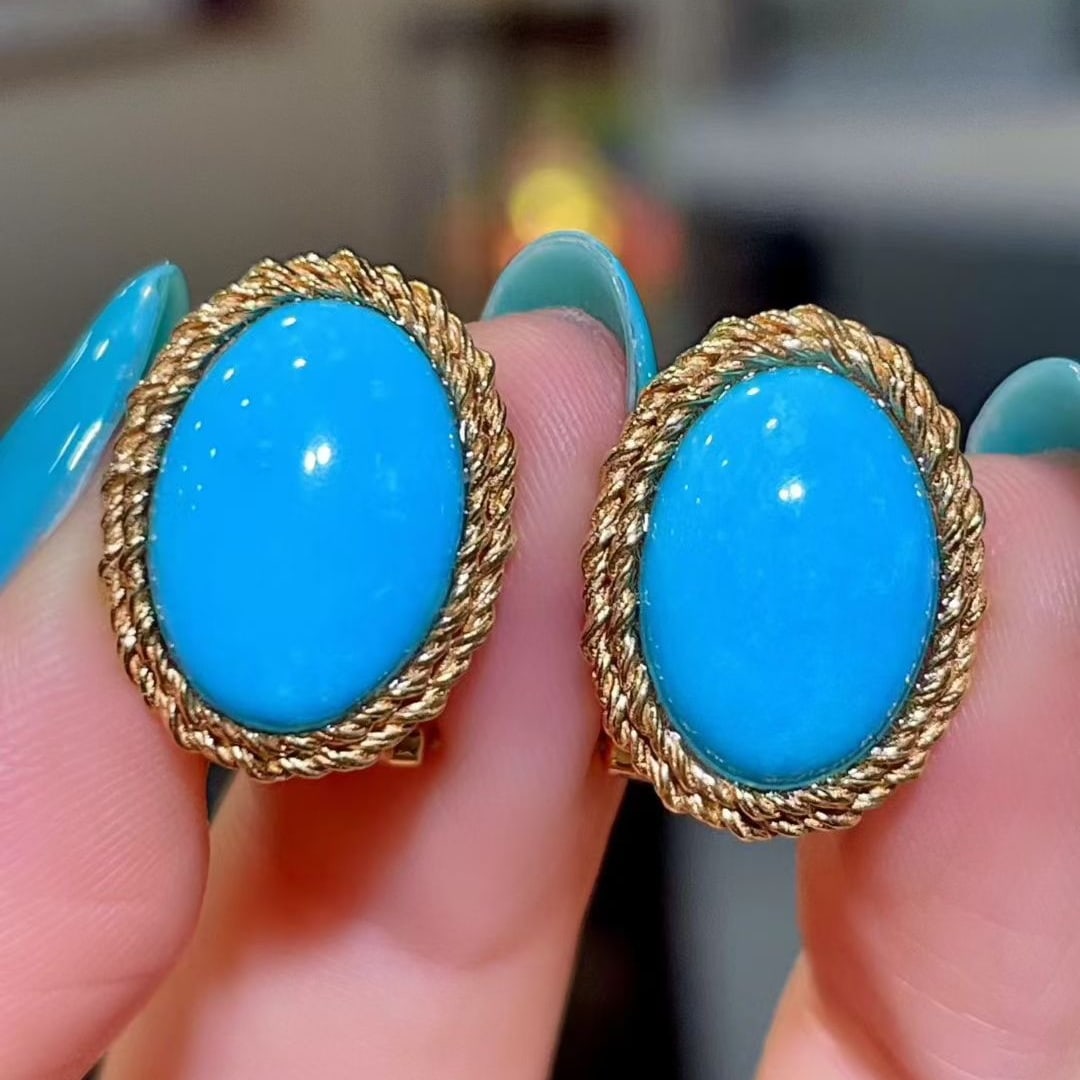 14k Gold 7.83 Ct Natural Turquoise Earrings: Ref:231065204 // gold content:14k gold // main gemstone:turquoise // shape:oval // carat weight:7. 83ct // color:blue // treatment:natural // Condition: NewLow Estimate: 5300.00High Estimate: 7900.00
