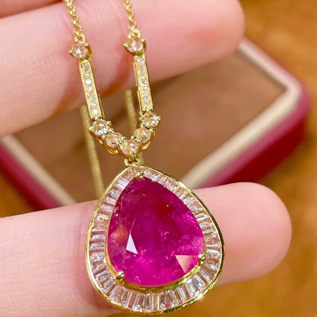 14k Gold 4.3 Ct Natural Tourmaline & Diamond & Sapphire Necklace: Ref:231065210 // gold content:14k gold // main gemstone:tourmaline // shape:pear // carat weight:4. 3ct // color:red // treatment:natural // // adjacent gemstone 2 : diamond // shape:round // clarity