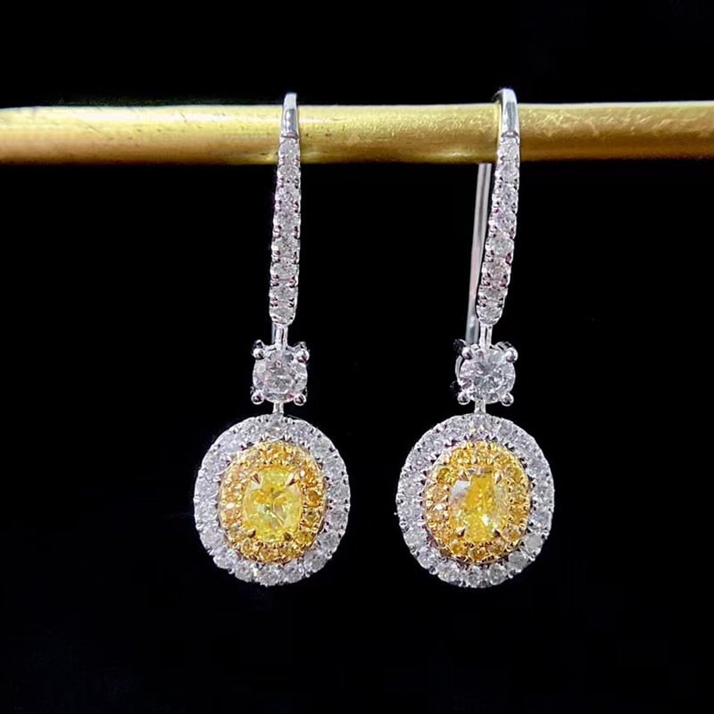 14k Gold 1.1 Ctw Natural Yellow Diamond & Diamond Earrings: Ref:231065227 // gold content:14k gold // main gemstone:yellow diamond // shape:oval // carat weight:0. 4ct // color:yellow // treatment:natural // // adjacent gemstone 2 : diamond // shape:round // c
