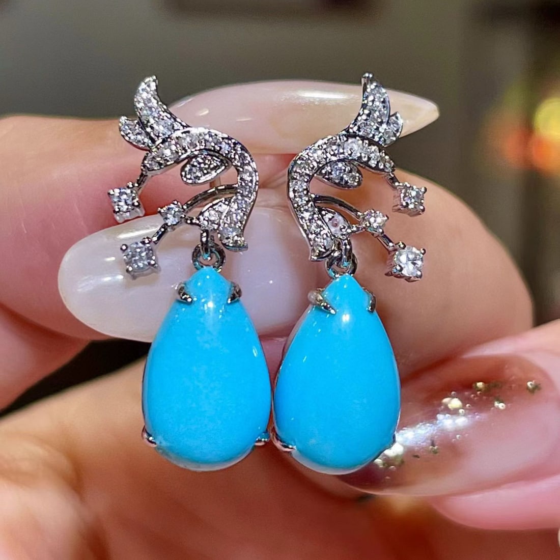 14k Gold 5.69 Ctw Natural Turquoise & Diamond Earrings: Ref:231065247 // gold content:14k gold // main gemstone:turquoise // shape:pear // carat weight:5. 39ct // color:blue // treatment:natural // // adjacent gemstone 2 : diamond // shape:round // carat w