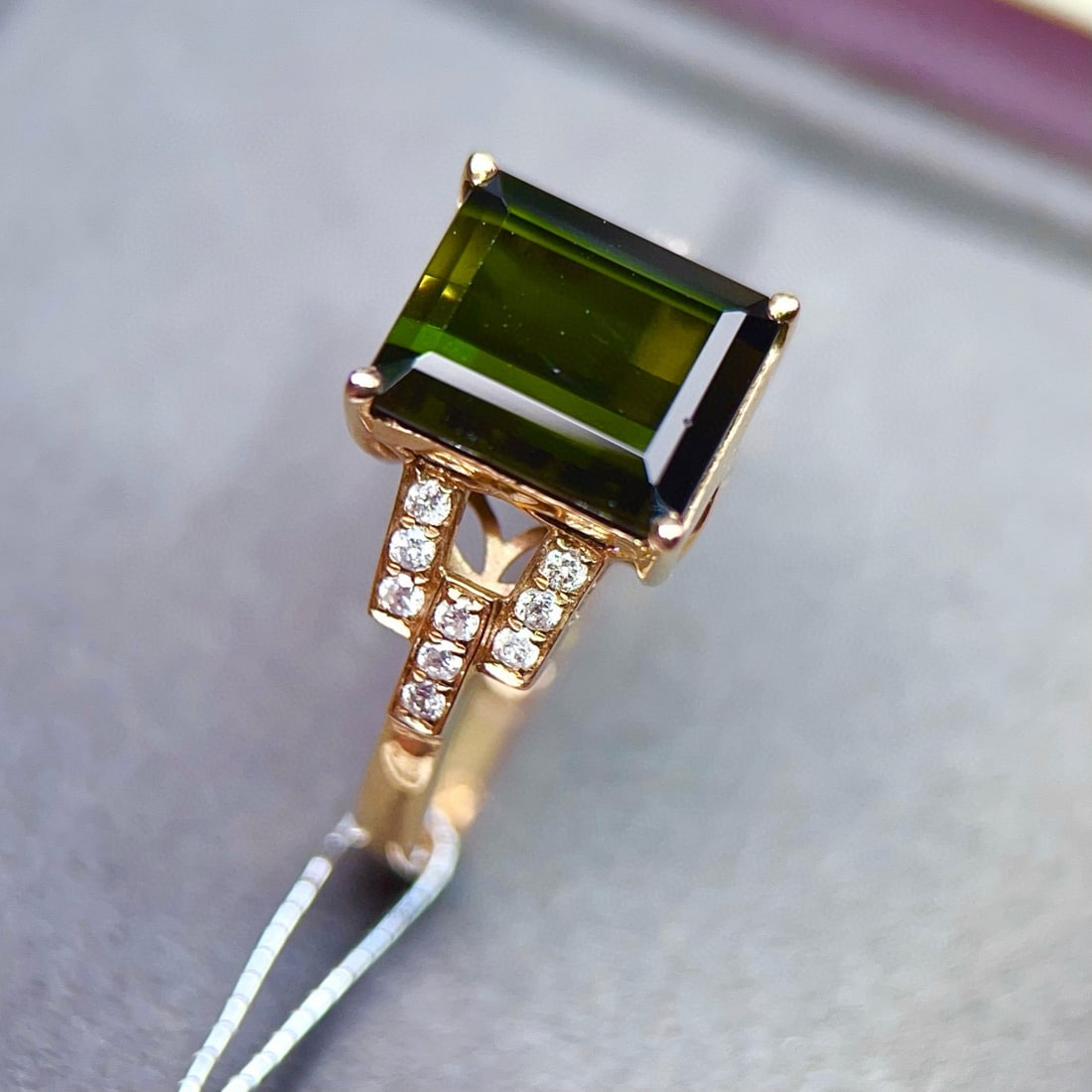 14k Gold 3.87 Ctw Natural Tourmaline & Diamond Ring: Ref:231066041 // gold content:14k gold // ring size:7. 25us // // main gemstone:tourmaline // shape:octagonal // carat weight:3. 73ct // color:green // treatment:natural // // adjacent gemstone 2