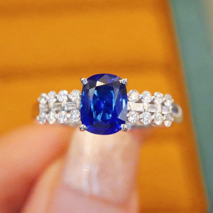 14k Gold 1.46 Ctw Natural Sapphire & Diamond Ring: Ref:231066097 // gold content:14k gold // ring size:7. 25us // // main gemstone:sapphire // shape:cushion // carat weight:1. 22ct // color:royal blue // treatment:natural // // adjacent gemstone 2