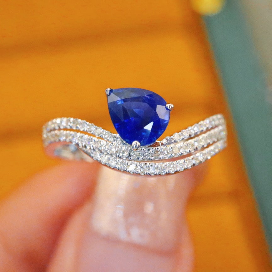 14k Gold 1.20 Ctw Natural Sapphire & Diamond Ring: Ref:231066141 // gold content:14k gold // ring size:7. 25us // // main gemstone:sapphire // shape:pear // carat weight:0. 97ct // color:royal blue // treatment:natural // // adjacent gemstone 2 :