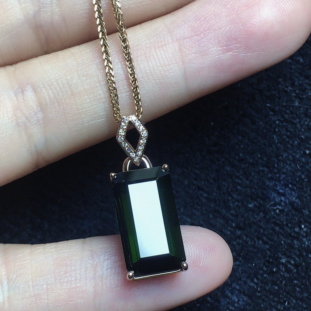 14k Gold 7.38 Ct Natural Tourmaline & Diamond Pendant( Without Chain ): Ref:231066159 // gold content:14k gold // main gemstone:tourmaline // shape:octagonal // carat weight:7. 38ct // color:green // treatment:natural // // adjacent gemstone 2 : diamond // number of