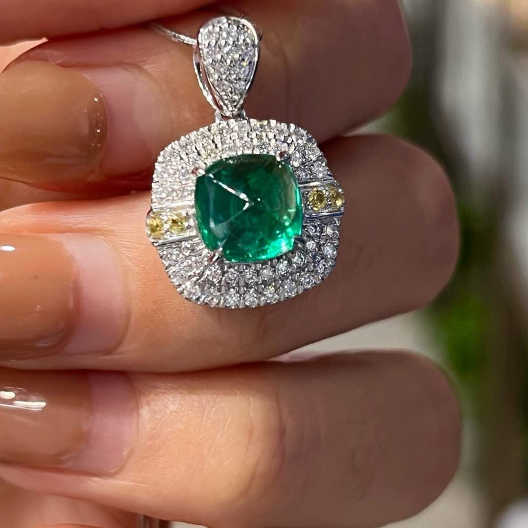 14k Gold 2.55 Ctw Vivid Green Natural Emerald & Diamond Pendant( Without Chain ): Ref:231066196 // gold content:14k gold // main gemstone:emerald // shape:sugar-loaf // carat weight:2. 19ct // color:vivid green // treatment:natural // // adjacent gemstone 2 : diamond // shape:round