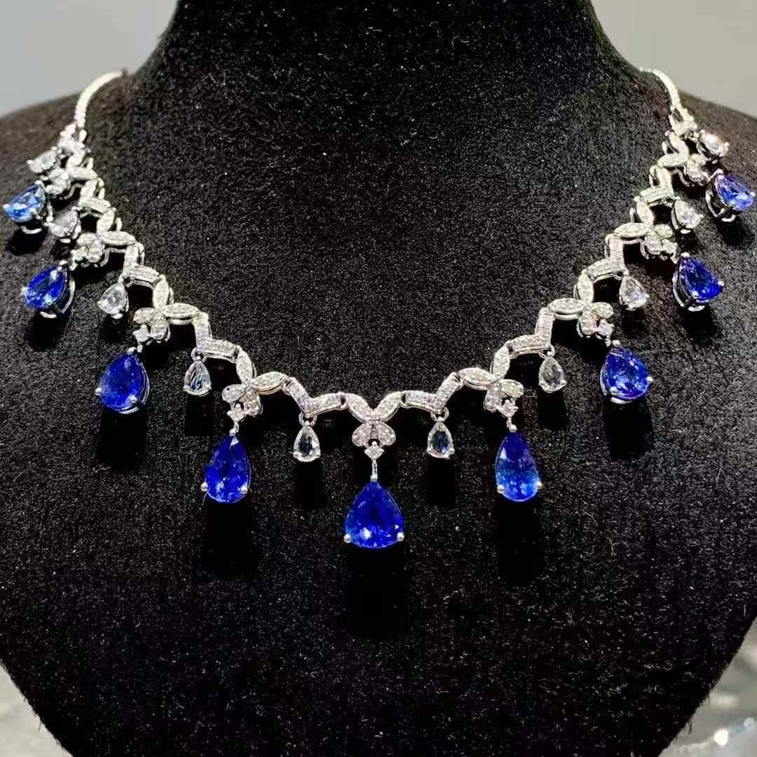 14k Gold 5.5 Ct Natural Sapphire & Diamond & Sapphire Necklace: Ref:231123003 // gold content:14k gold // main gemstone:sapphire // shape:pear // carat weight:5. 5ct // color:blue // treatment:natural // // adjacent gemstone 2 : diamond // shape:round // clarity g