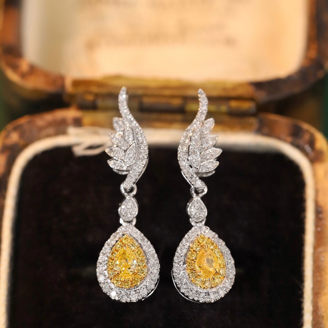 14k Gold 0.60 Ctw Natural Yellow Diamond & Diamond Earrings: Ref:231123046 // gold content:14k gold // main gemstone:yellow diamond // shape:pear // carat weight:0. 18ct // color:yellow // treatment:natural // // adjacent gemstone 2 : diamond // shape:round