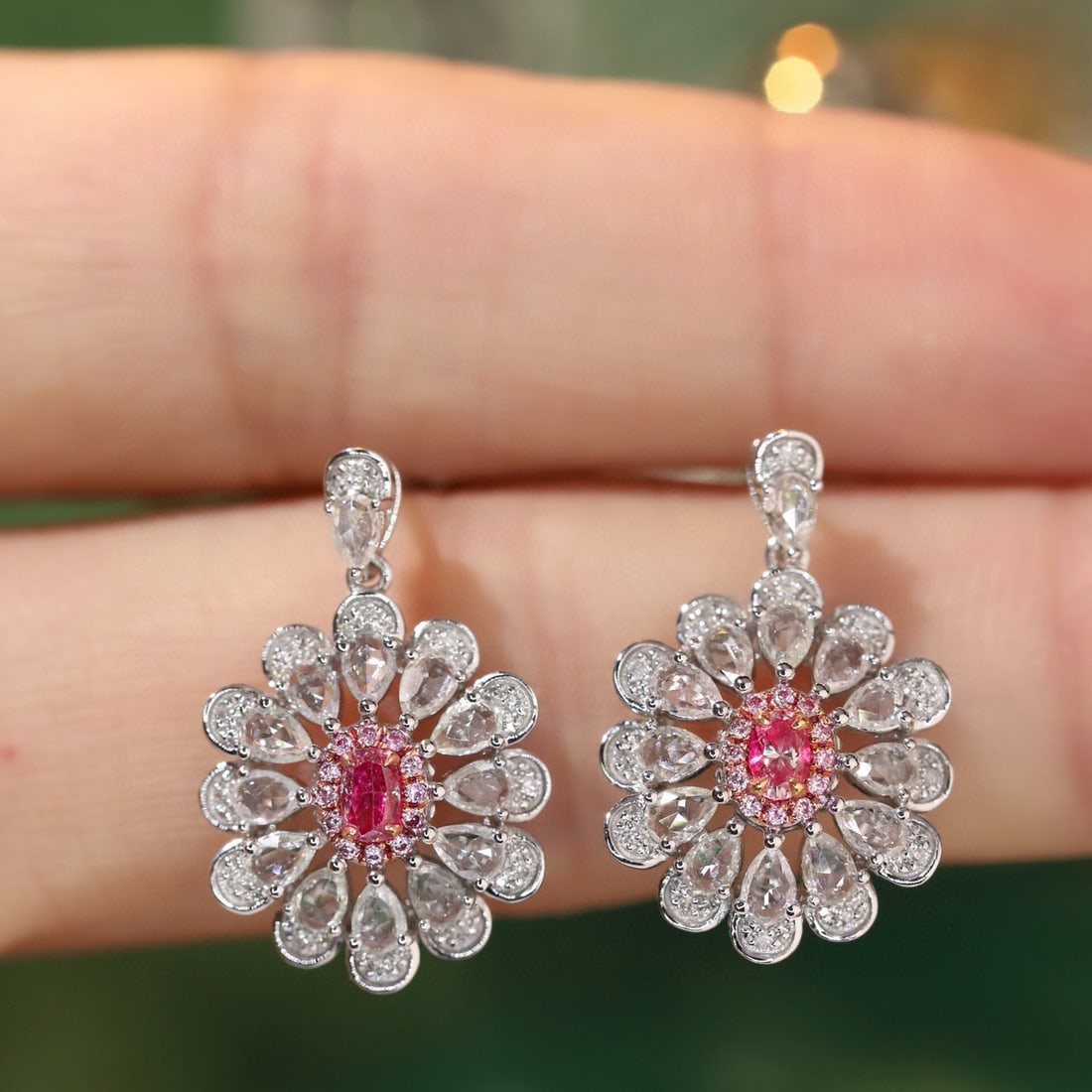 14k Gold 0.4 Ctw Natural Pink Diamond & Color Diamond Earrings: Ref:231123091 // gold content:14k gold // main gemstone:pink diamond // shape:oval // carat weight:0. 2ct // color:pink // treatment:natural // // adjacent gemstone 2 : color diamond // shape:round //