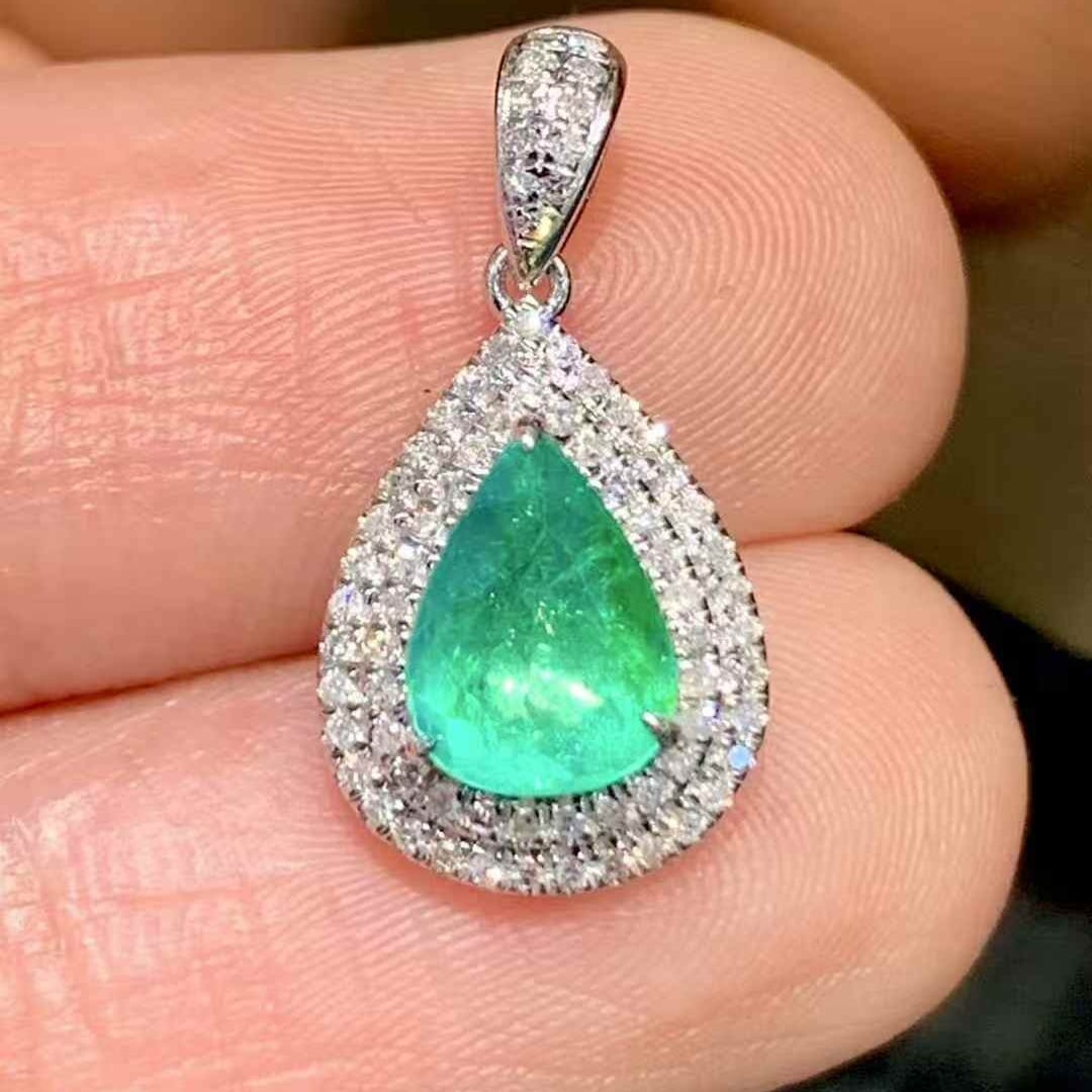 14k Gold 1.01 Ct Natural Paraiba Tourmaline & Diamond Pendant( Without Chain ): Ref:231123109 // gold content:14k gold // main gemstone:paraiba tourmaline // shape:pear // carat weight:1. 01ct // color:bluish green // treatment:natural // // adjacent gemstone 2 : diamond // shape