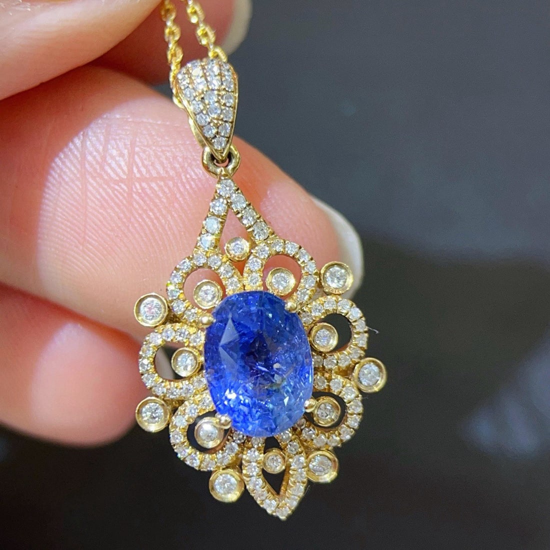 14k Gold 2.98 Ctw Natural Sapphire & Diamond Pendant( Without Chain ): Ref:231123172 // gold content:14k gold // main gemstone:sapphire // shape:oval // carat weight:2. 65ct // color:blue // treatment:natural // // adjacent gemstone 2 : diamond // shape:round // carat