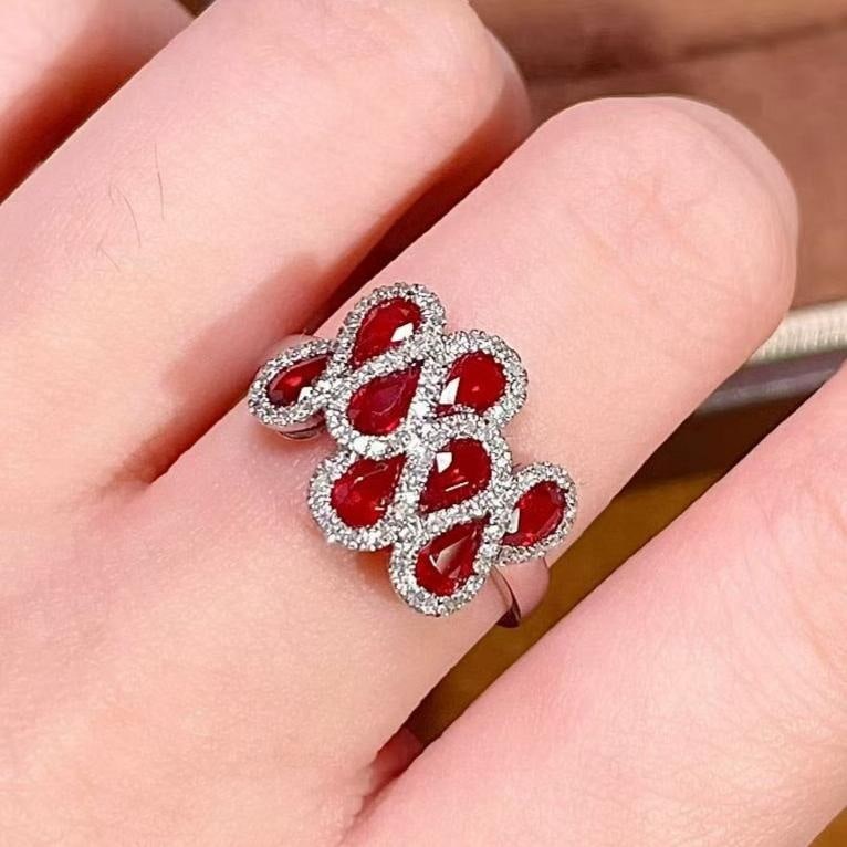 14k Gold 1.8 Ct Natural Ruby & Diamond Ring: Ref:231123208 // gold content:14k gold // ring size:7. 25us // // main gemstone:ruby // shape:pear // carat weight:1. 8ct // color:red // treatment:natural // // adjacent gemstone 2 : diamond // numbe