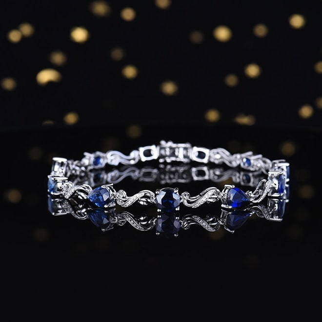 14k Gold 7.31 Ctw Natural Sapphire & Diamond Bracelet: Ref:231124028 // gold content:14k gold // main gemstone:sapphire // shape:multiple // carat weight:7. 18ct // color:blue // treatment:natural // // adjacent gemstone 2 : diamond // number of