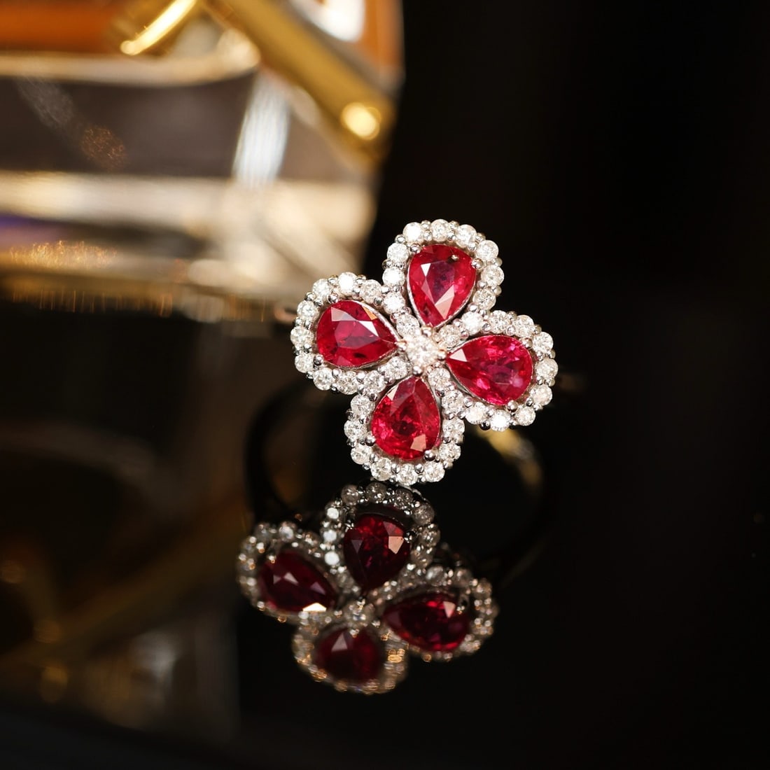 14k Gold 1.98 Ctw Natural Ruby & Diamond Ring: Ref:231124044 // gold content:14k gold // ring size:7. 25us // // main gemstone:ruby // shape:pear // carat weight:1. 55ct // color:red // treatment:natural // // adjacent gemstone 2 : diamond //