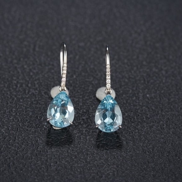 14k Gold 3.49 Ct Natural Aquamarine & Diamond Earrings: Ref:231124056 // gold content:14k gold // main gemstone:aquamarine // shape:pear // carat weight:3. 49ct // color:santa maria color // treatment:natural // // adjacent gemstone 2 : diamond // shape:ro